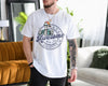 white unisex t-shirt with a cool skeleton in sunglasses and cap flashing peace signs, awesome like my daughter shirt graphic