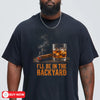 navy unisex backyard cigar and whiskey t-shirt with a lit cigar, bourbon on the rocks, and the text I'll Be in the Backyard