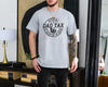 Black unisex t-shirt with distressed stamp graphic reading Official Dad Tax If I'm Buyin' I'm Tryin', dad fathers day gifts idea