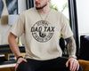Black unisex t-shirt with distressed stamp graphic reading Official Dad Tax If I'm Buyin' I'm Tryin', dad fathers day gifts idea