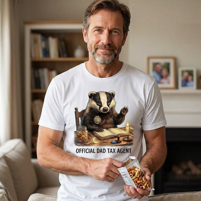 white Unisex dad tax agent t-shirt featuring a vintage badger in a suit sitting at a desk with a badge, candle and open book
