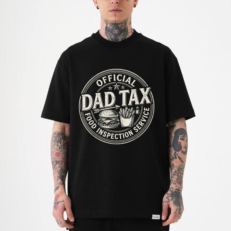 Black unisex t-shirt with vintage badge graphic reading Official Dad Tax Food Inspection Service with burger and fries illustration