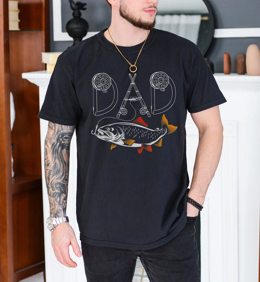 Black unisex fishing dad t-shirt with fly rod letters spelling DAD and a colorful fish graphic below