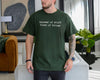 Dark grey unisex t-shirt printed with 'knower of stuff fixer of things' — funny dad shirt for handy men