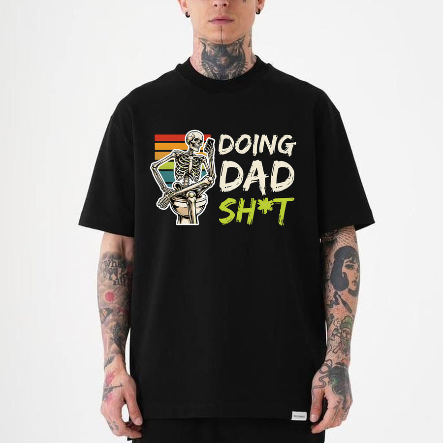 Black unisex funny dad shirt with a skeleton sitting on a toilet and the text Doing Dad Sh*t in bold retro lettering