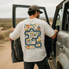 White funny dad shirt with Tired Dads Club text on front and colorful construction road map print on the back