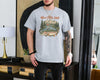 Sport grey funny fishing dad shirt with reel cool dad text and a vintage fly fishing mountain river trout graphic