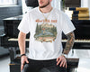 White funny fishing dad shirt with reel cool dad text and a vintage fly fishing mountain river trout graphic
