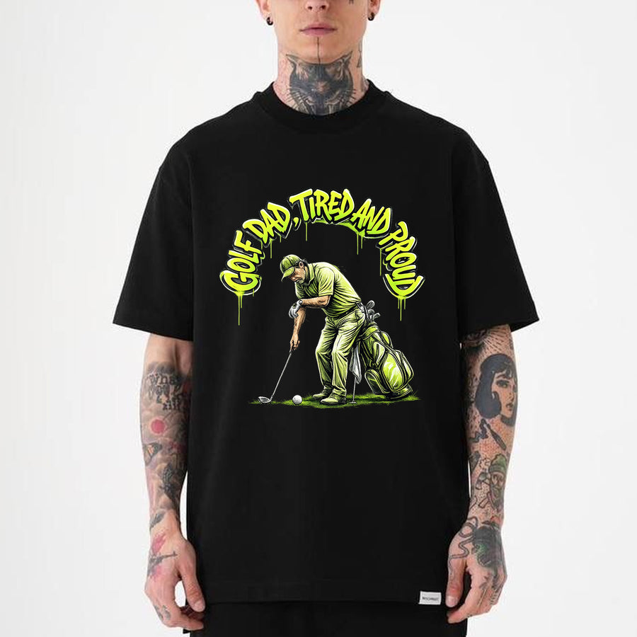 blackFunny golf dad shirt with graffiti-style text and illustrated golfer lining up a putt beside a green golf bag