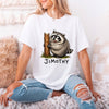 White unisex funny raccoon graphic tee featuring a chubby cartoon raccoon hugging a tree stump with the name Jimothy below