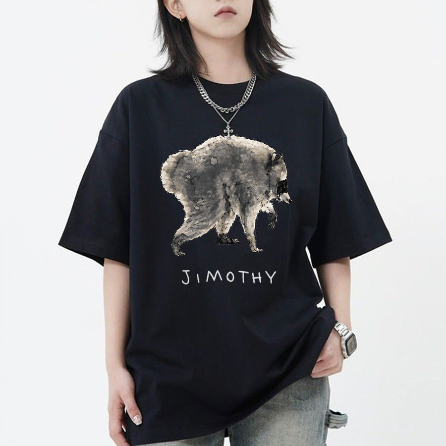 Black unisex funny raccoon graphic tee featuring a chubby cartoon raccoon hugging a tree stump with the name Jimothy below
