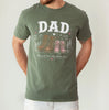 milytarygreen girl dad shirt featuring large work boots beside small pink girl boots with the words Dad My First Love My Forever Hero printed on the chest