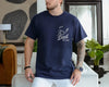 Ivory unisex golf dad shirt with green sketch graphic of a golf club striking a ball and the text Best Dad By Par on the chest