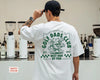 White unisex golf grandpa shirt with 'Golf Grandpas Club – Best Grandpa By Par' retro graphic on the back