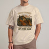 Just resting my eyes club shirt featuring a bigfoot dad relaxing in an armchair by a campfire under mountain and night sky scenery
