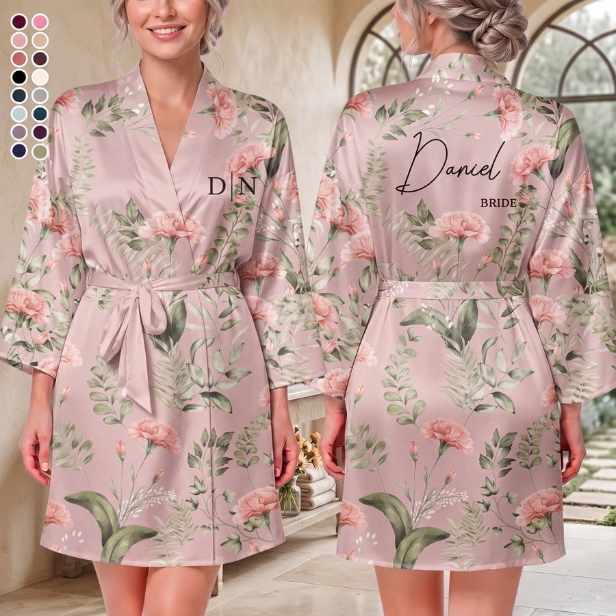 Personalized birth flower bridesmaid robe in light blue satin with orange florals, custom name Charlotte and monogram on back