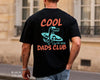 Black unisex t-shirt front and back with personalized cool dads club surf alligator graphic in blue and coral, est. 2026 text
