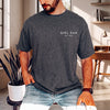 Dark grey personalized girl dad shirt with custom EST year printed on the chest, worn by a bearded man